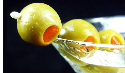 photo of martini glass with olives